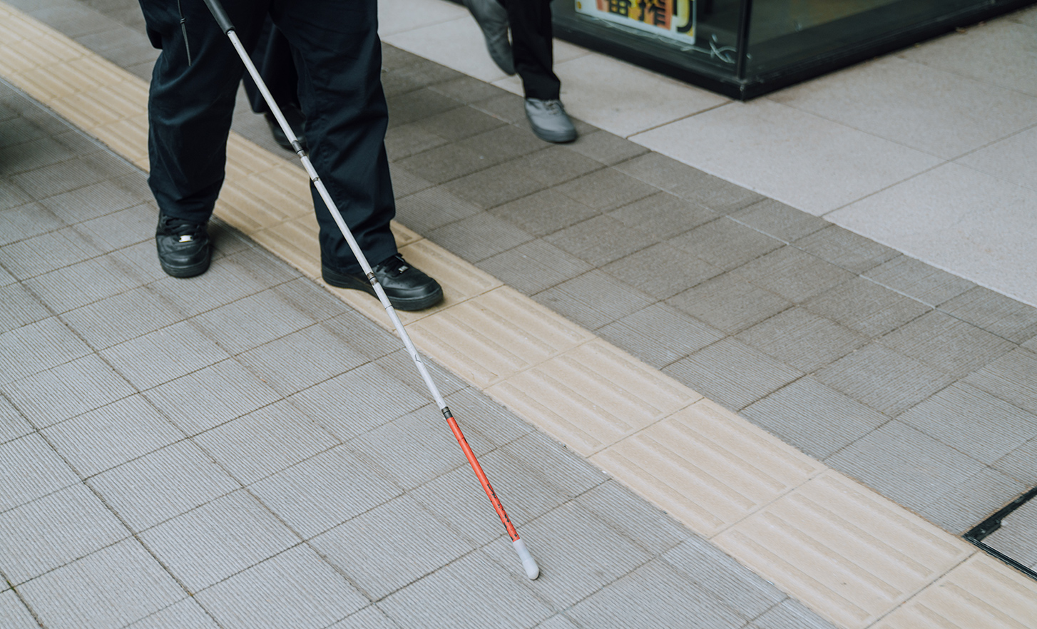 White cane and braille blocks