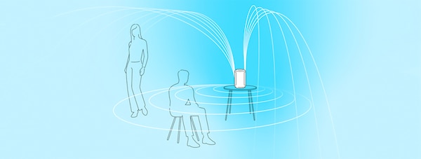 Illustration of two people in close proximity to a speaker emitting sound waves.