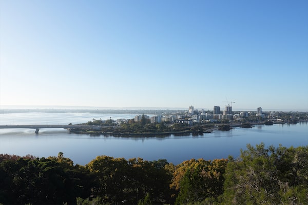 Landscape photograph of a city and lake